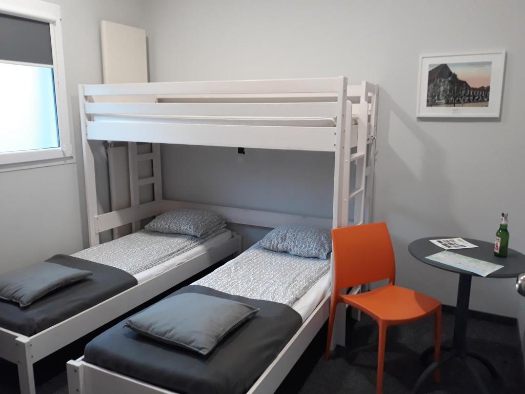 Postel nebo postele na pokoji v ubytování Hostel Sopot Centrum