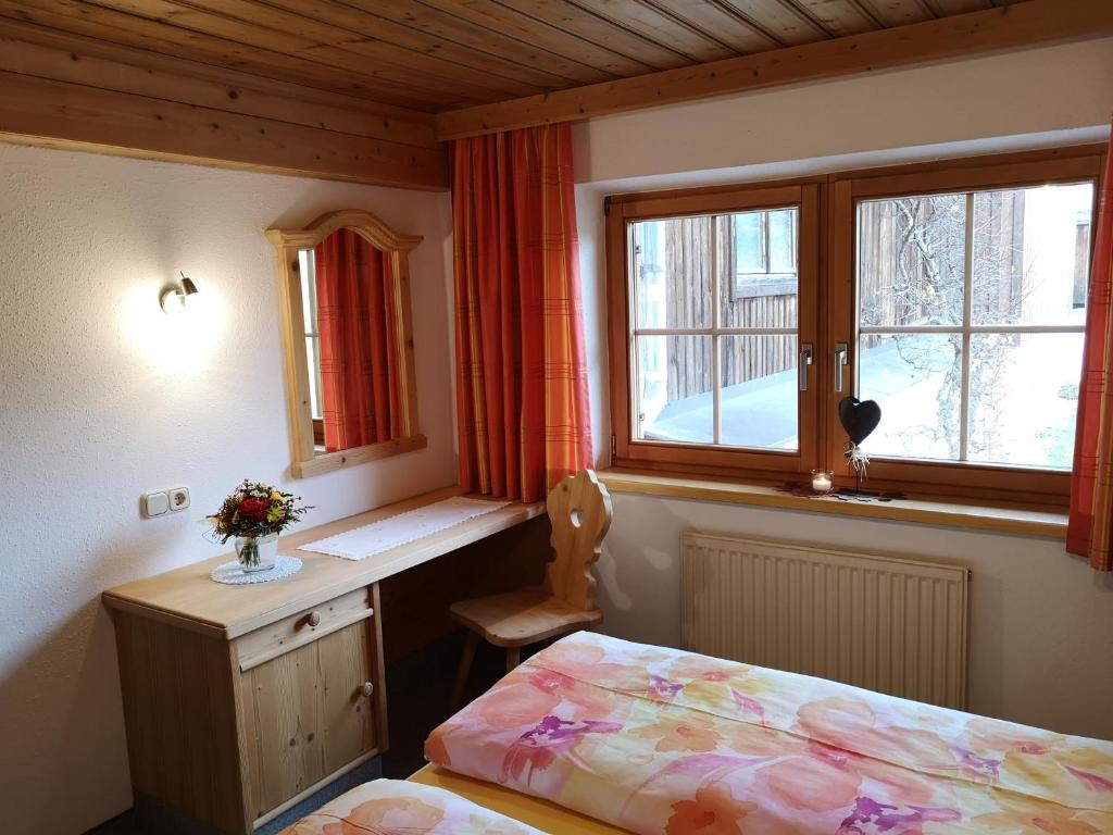 Postel nebo postele na pokoji v ubytování Vornbichlhof