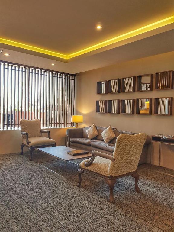 Posezení v ubytování Hotel Palacio Azteca