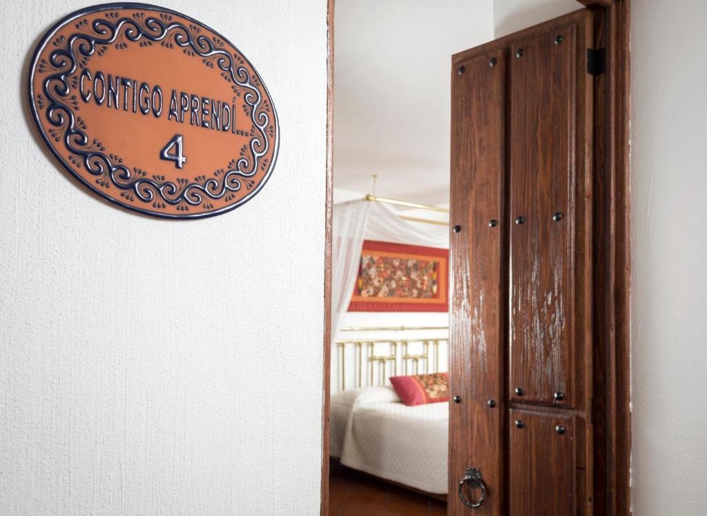 Postel nebo postele na pokoji v ubytování Hotel Tapalpa de Mis Amores