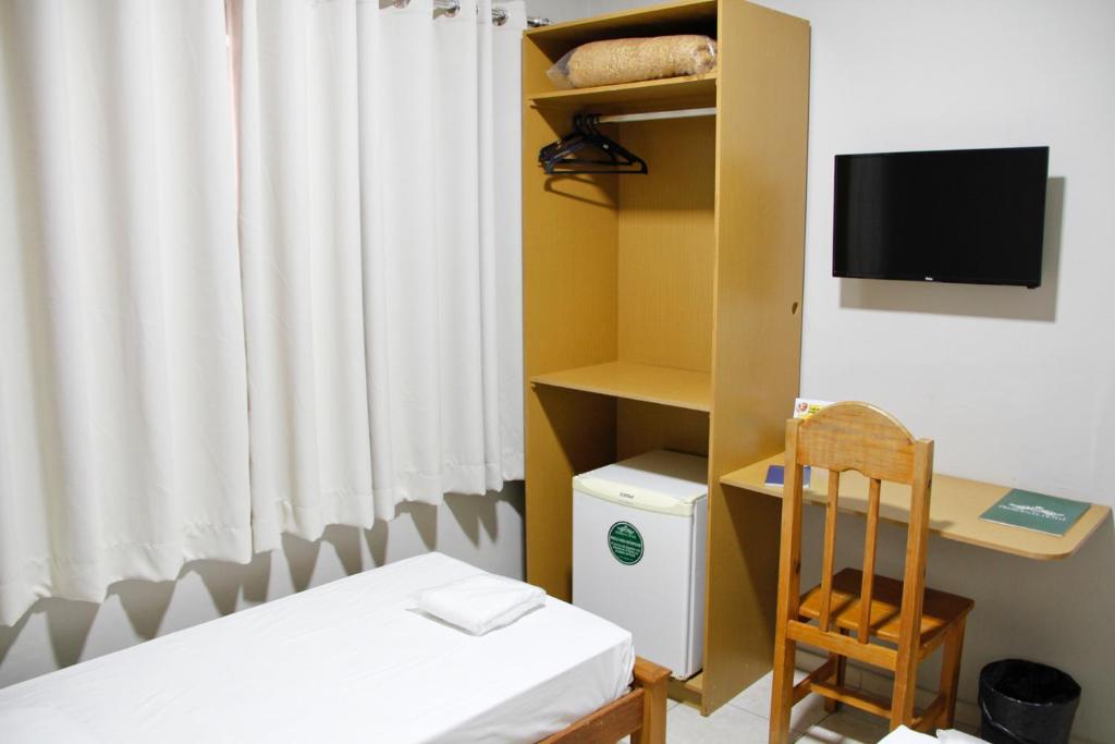 TV a/nebo společenská místnost v ubytování Presidente Hotel