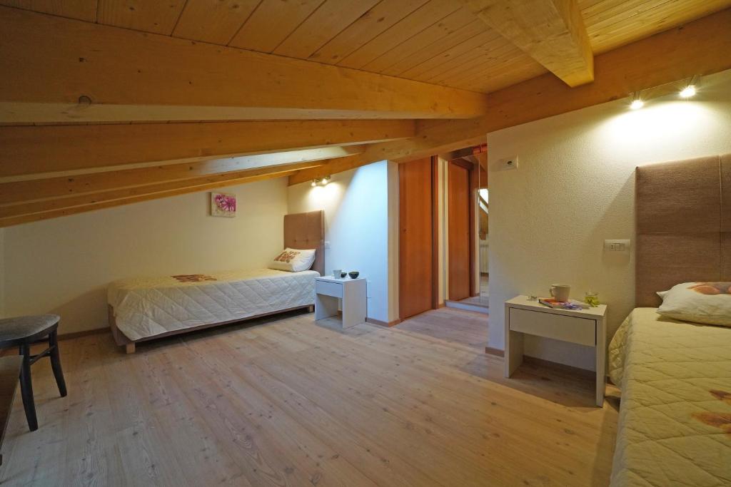 Łóżko lub łóżka w pokoju w obiekcie Villa delle Querce