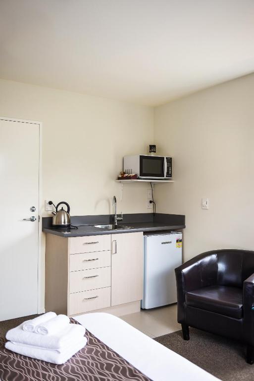 Kuchyň nebo kuchyňský kout v ubytování 123 Motel