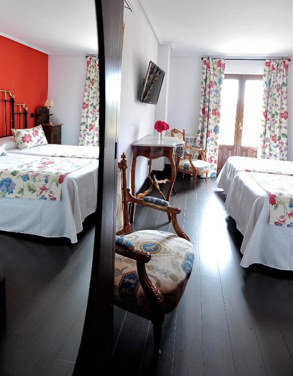 Postel nebo postele na pokoji v ubytování Hotel-Hospedería los Templarios