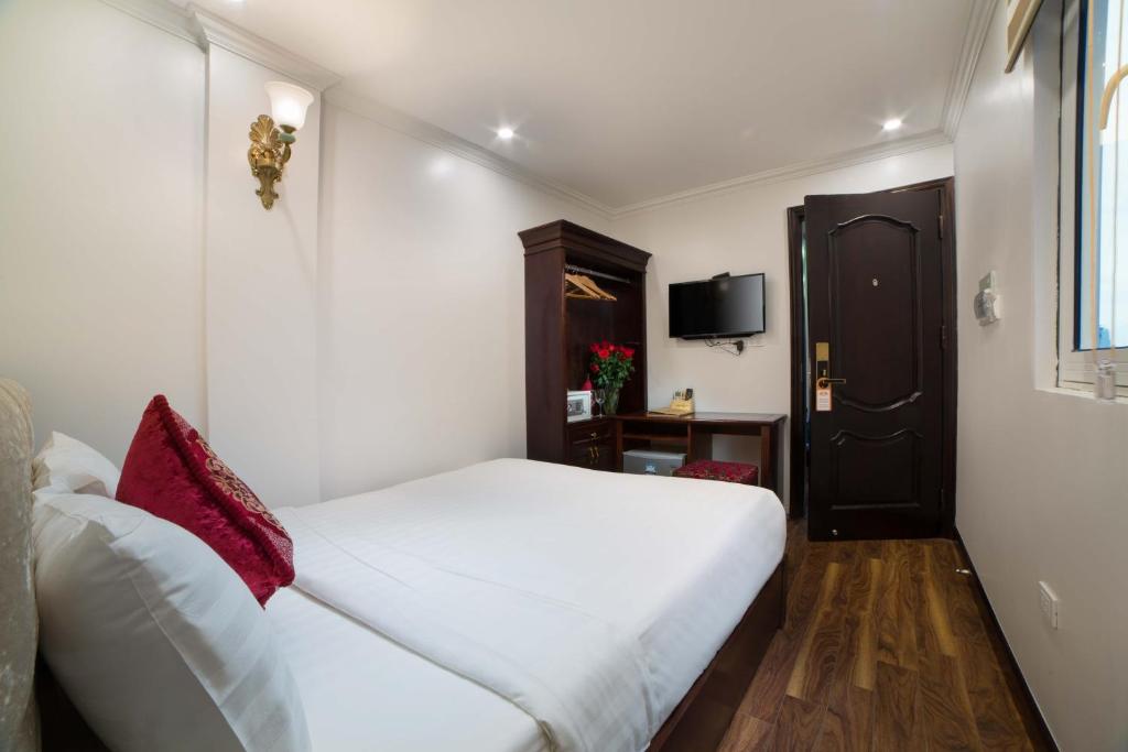 Postel nebo postele na pokoji v ubytování Golden Sail Hotel & Spa