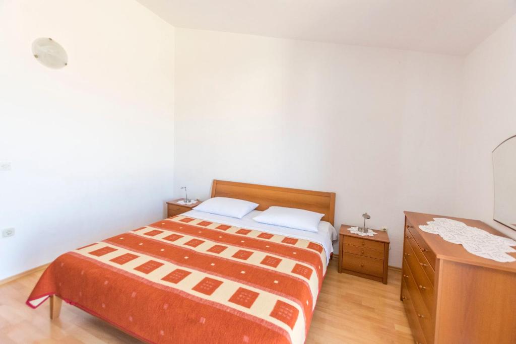 Postel nebo postele na pokoji v ubytování Apartments Matejka