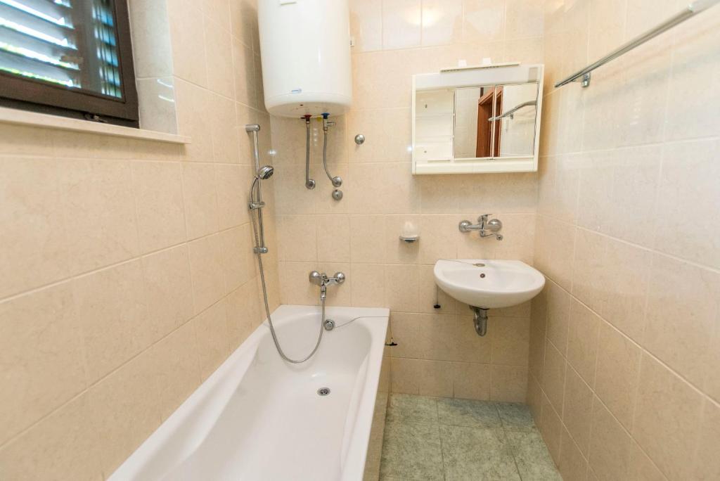 Koupelna v ubytování Apartments Matejka