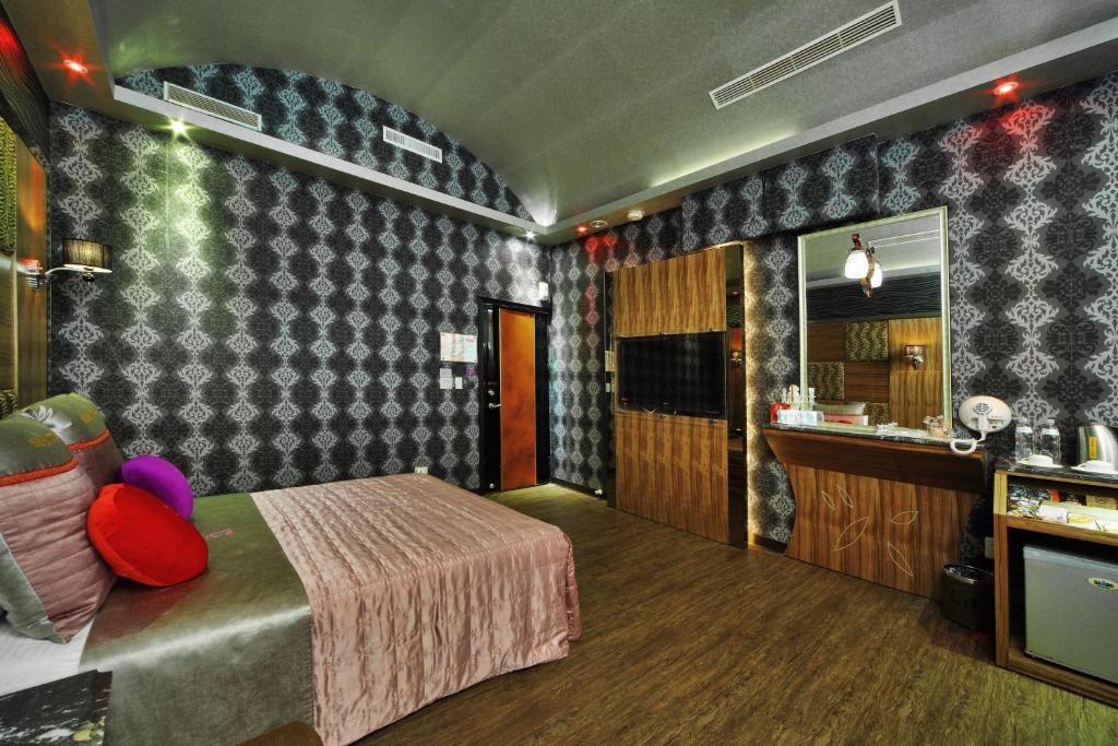 TV a/nebo společenská místnost v ubytování Giyoche Motel