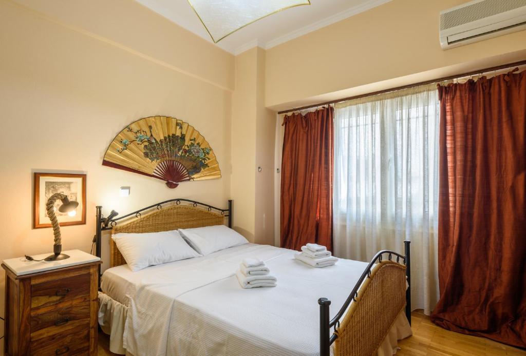 Posteľ alebo postele v izbe v ubytovaní Sophie's Penthouse in Athens