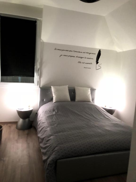 Postel nebo postele na pokoji v ubytování Le Clos Normandy