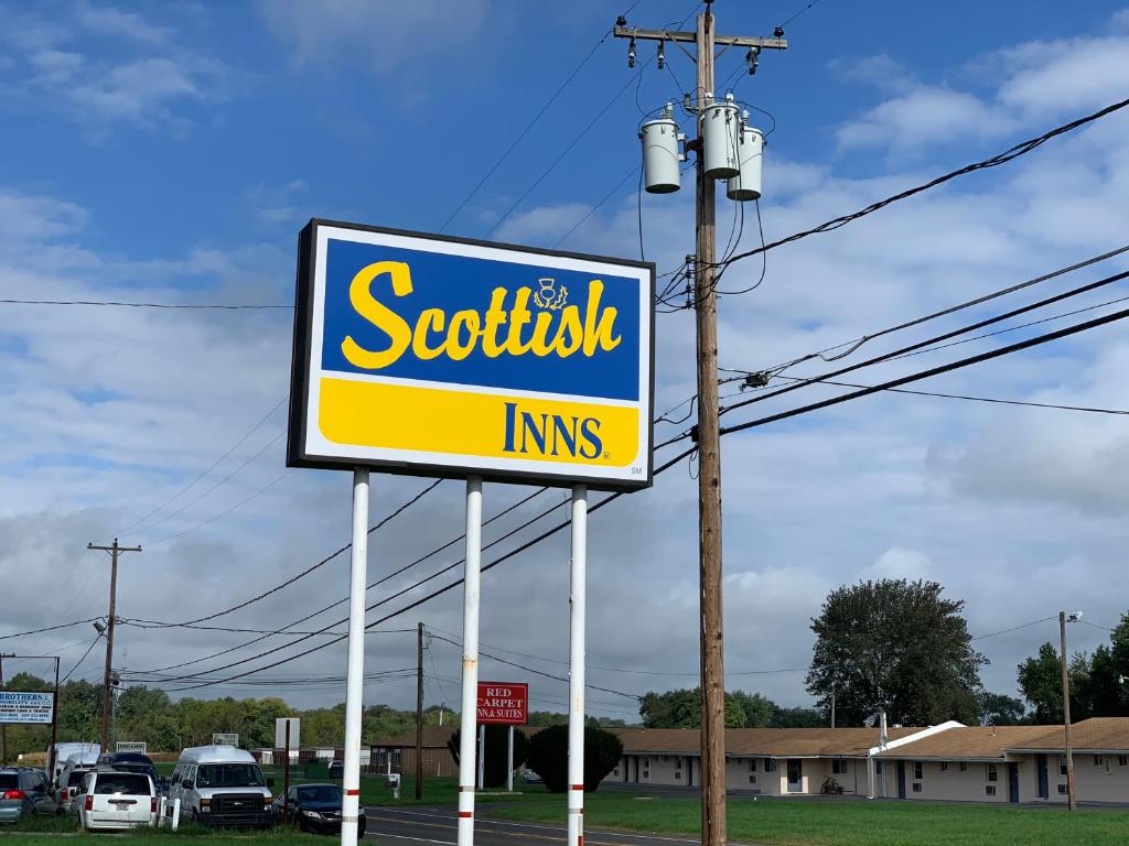 a sign for a softkin inc store on a street at Scottish Inns Wrightstown in Wrightstown