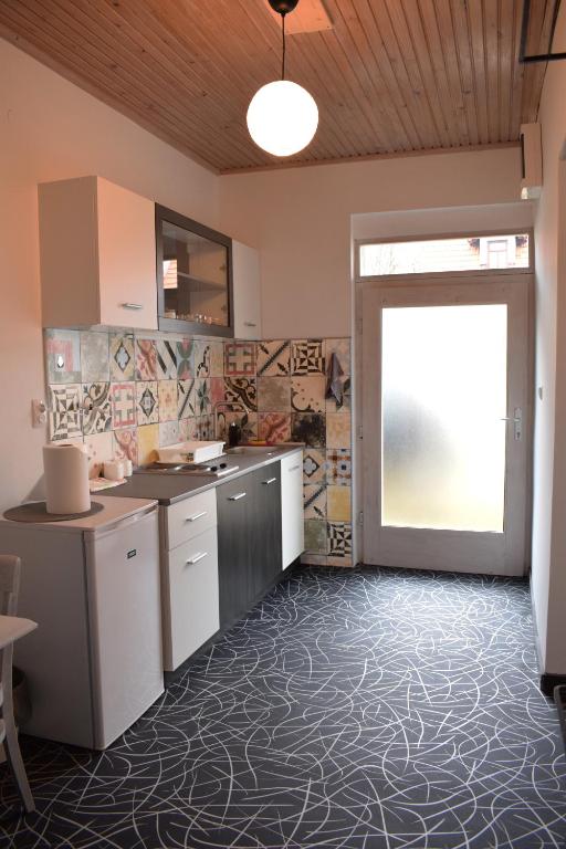 Kuchyňa alebo kuchynka v ubytovaní Studio apartment LoSt