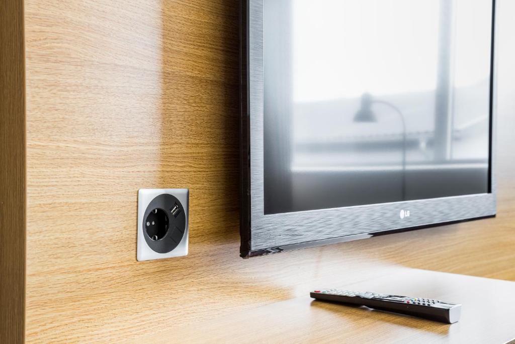 TV a/nebo společenská místnost v ubytování Hotel Spekeröd