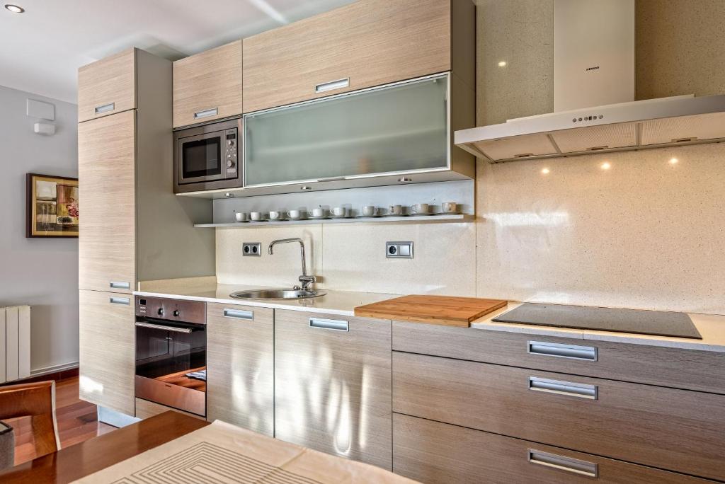 Kuchyň nebo kuchyňský kout v ubytování Apartamento con encanto en Badalona