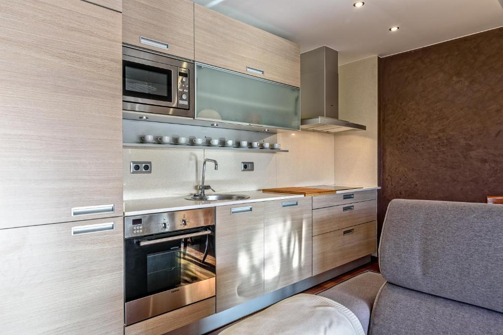 Kuchyň nebo kuchyňský kout v ubytování Apartamento con encanto en Badalona