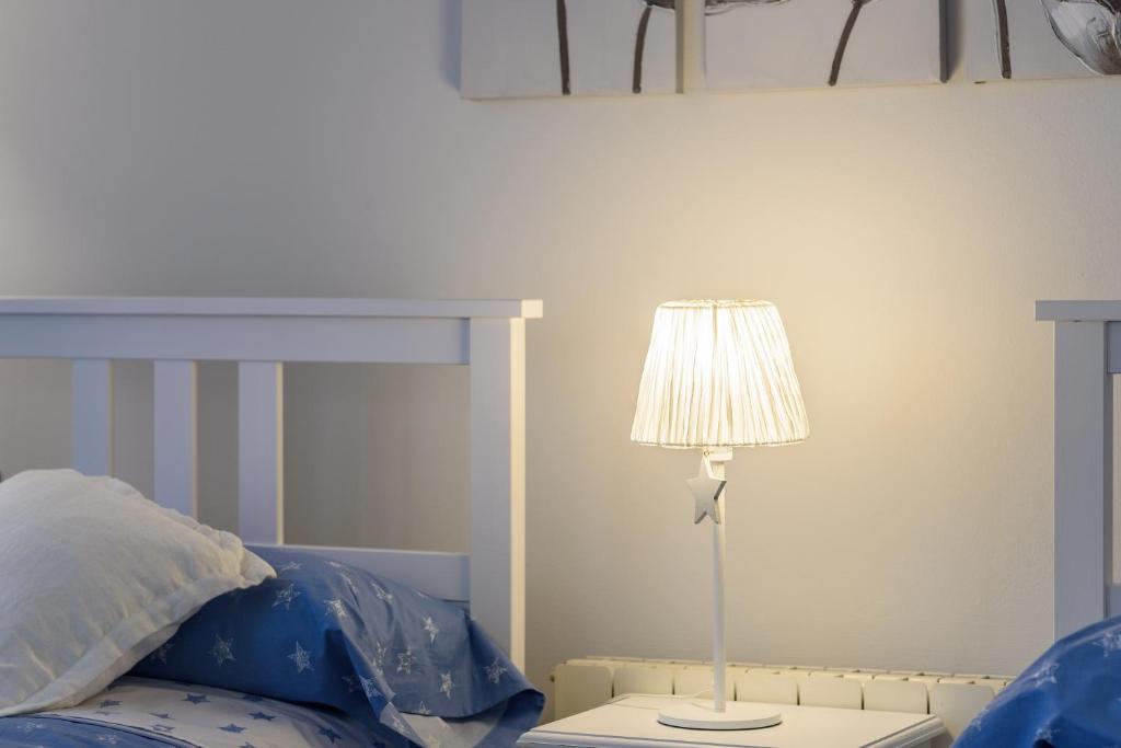 Postel nebo postele na pokoji v ubytování Apartamento con encanto en Badalona