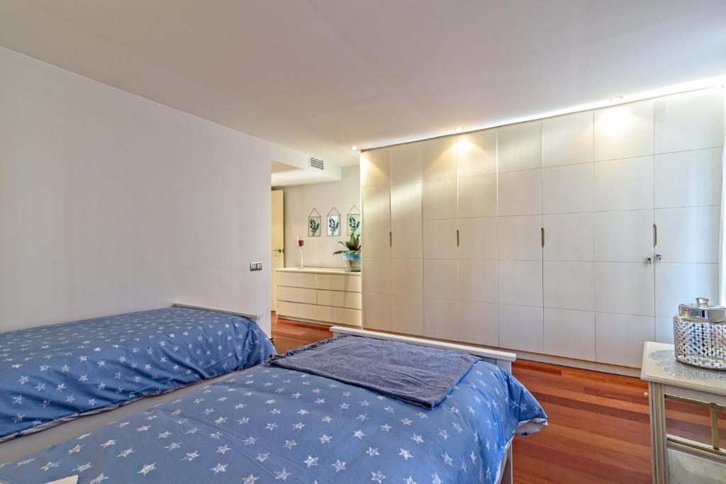 Postel nebo postele na pokoji v ubytování Apartamento con encanto en Badalona