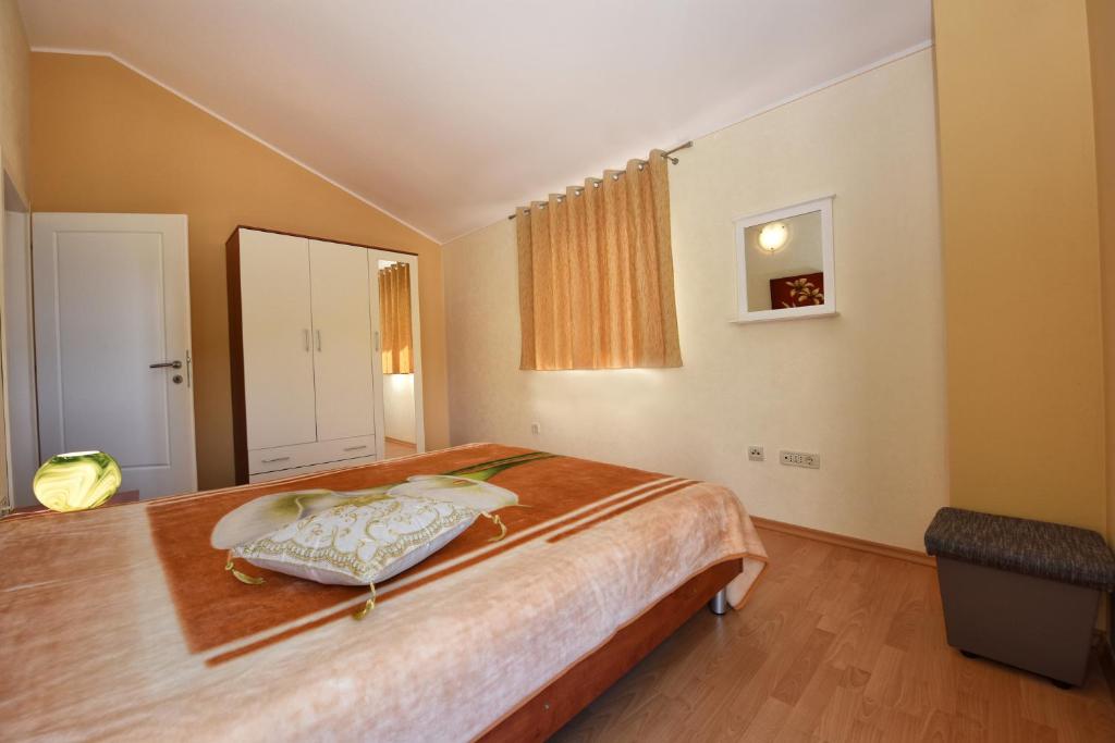 Postel nebo postele na pokoji v ubytování Villa Kmacici 377