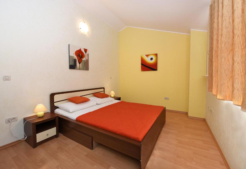 Postel nebo postele na pokoji v ubytování Villa Kmacici 377