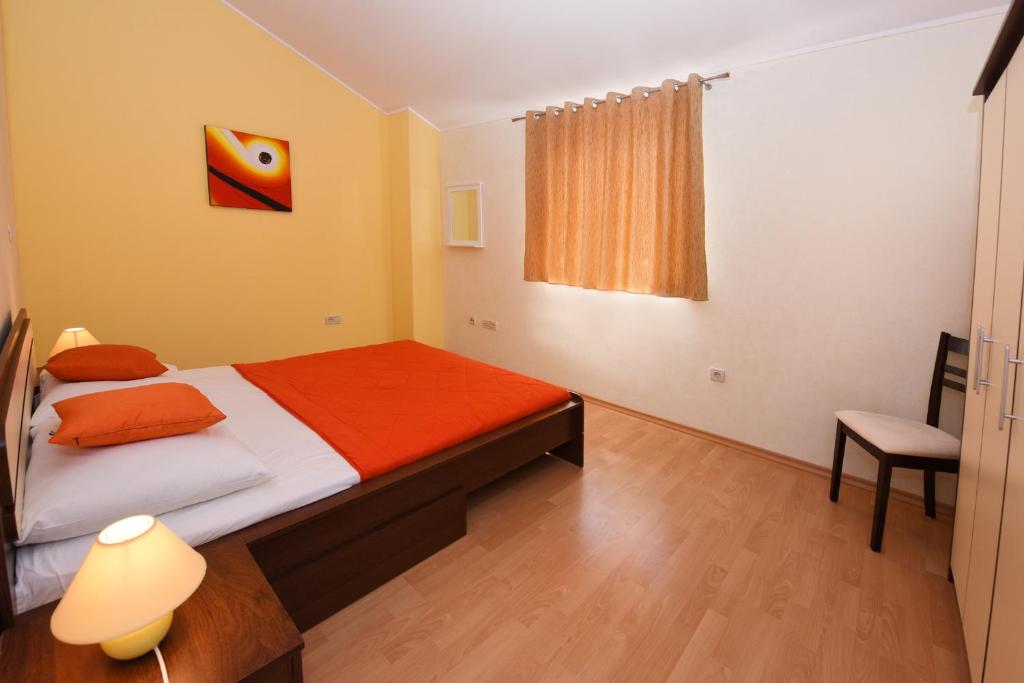 Postel nebo postele na pokoji v ubytování Villa Kmacici 377