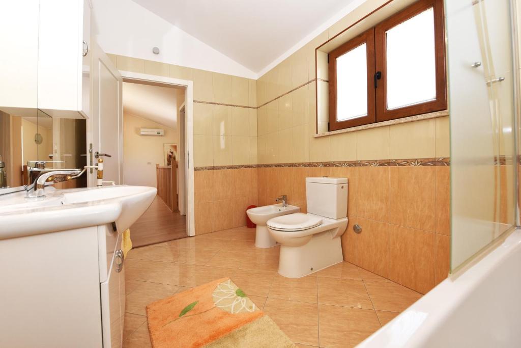 Koupelna v ubytování Villa Kmacici 377