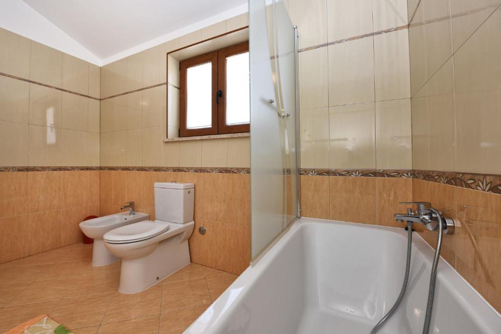 Koupelna v ubytování Villa Kmacici 377
