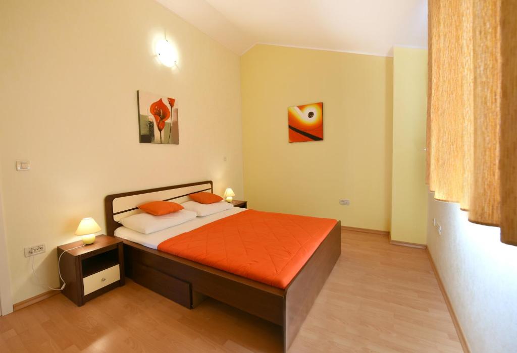 Postel nebo postele na pokoji v ubytování Villa Kmacici 377