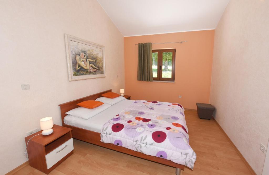 Postel nebo postele na pokoji v ubytování Villa Kmacici 377