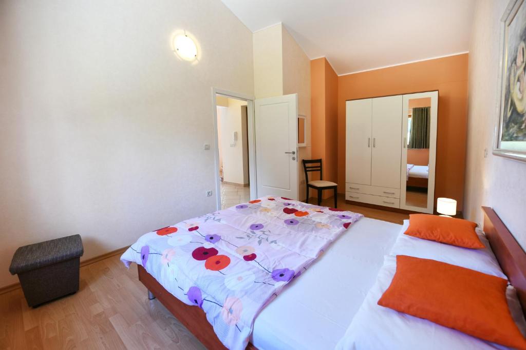 Postel nebo postele na pokoji v ubytování Villa Kmacici 377