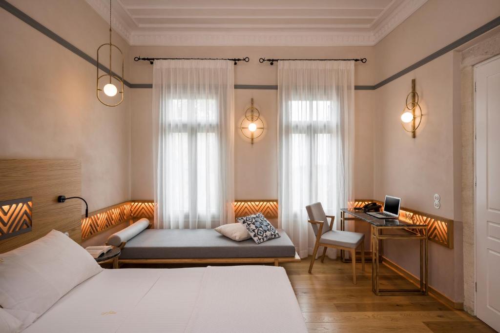 Postel nebo postele na pokoji v ubytování Scala de Faro