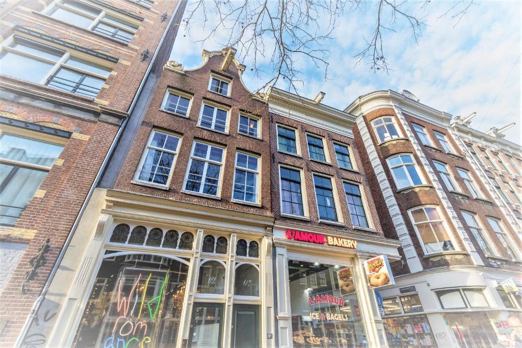 a building with a store in front of it at Sunflower Amsterdam in Amsterdam