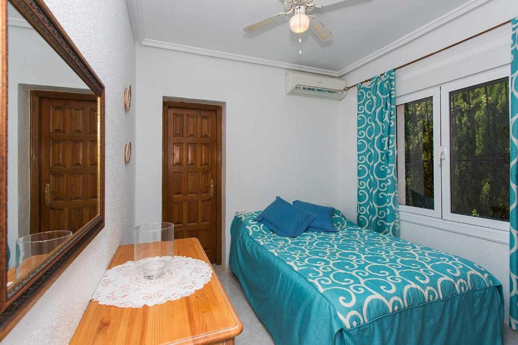 Postel nebo postele na pokoji v ubytování CH Villa Murillo Ciudad Quesada