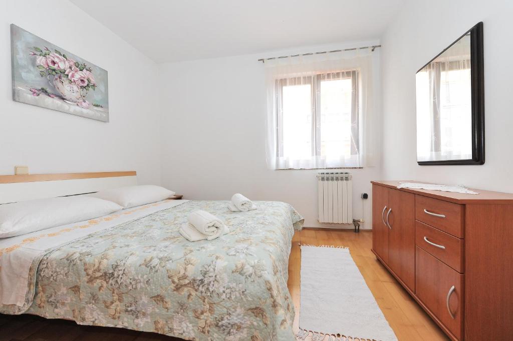 Posteľ alebo postele v izbe v ubytovaní Guesthouse Barić