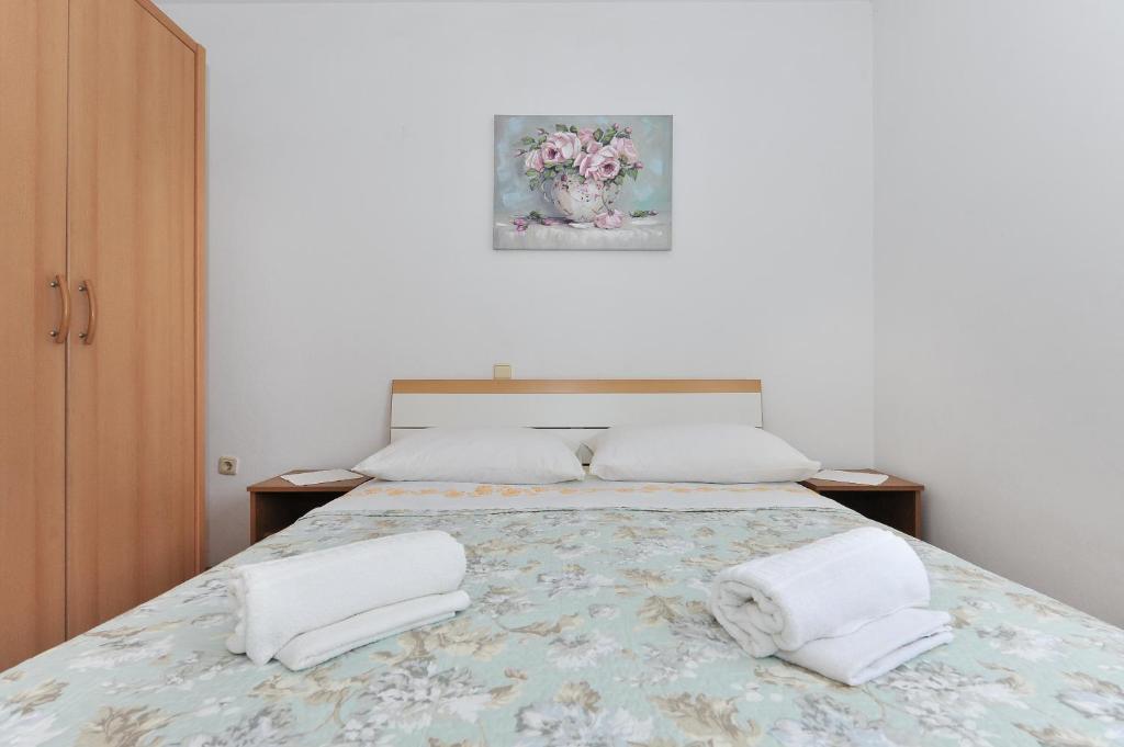 Posteľ alebo postele v izbe v ubytovaní Guesthouse Barić