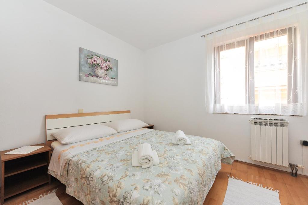 Posteľ alebo postele v izbe v ubytovaní Guesthouse Barić