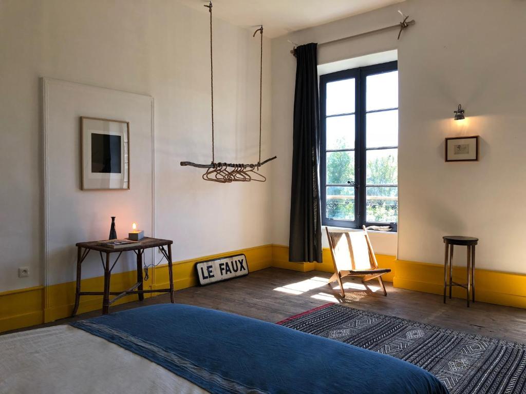 Postel nebo postele na pokoji v ubytování Maison CHA-RI-VA-RI