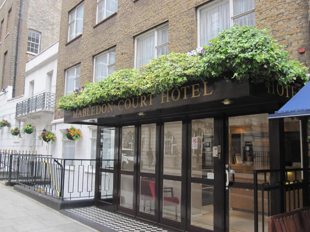 a building with a sign that reads malcolm court hotel at Mabledon Court Hotel in London