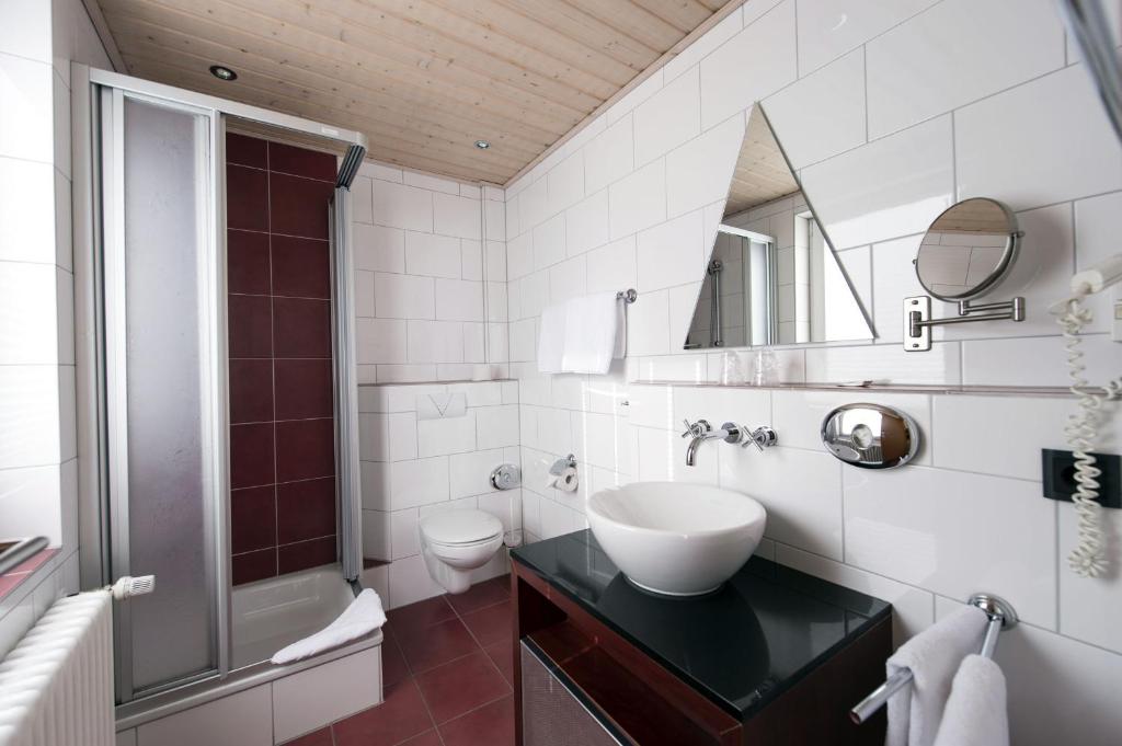 Koupelna v ubytování Hotel Garni Elegant