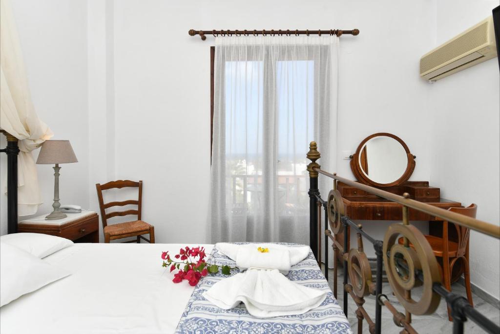 Postel nebo postele na pokoji v ubytování Hotel Swiss Home