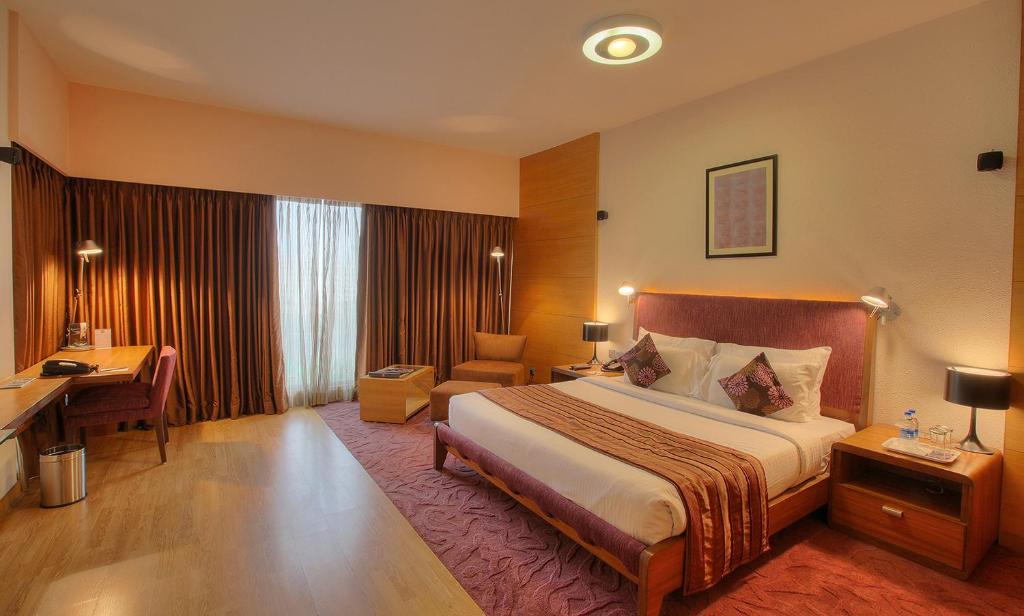 Postel nebo postele na pokoji v ubytování Hotel Parc Estique