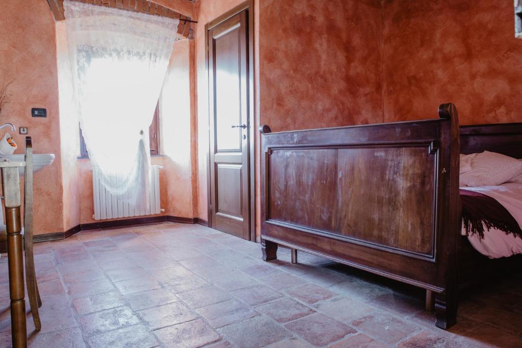 Postel nebo postele na pokoji v ubytování Agriturismo Le Piagge