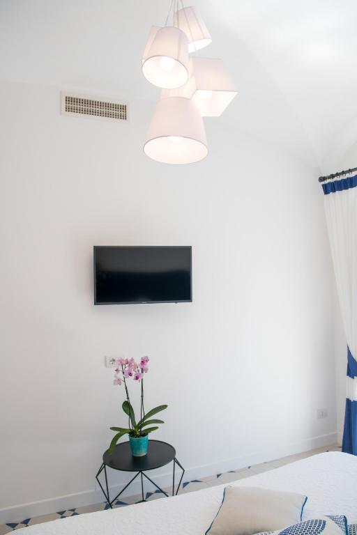 TV a/nebo společenská místnost v ubytování Punta Re