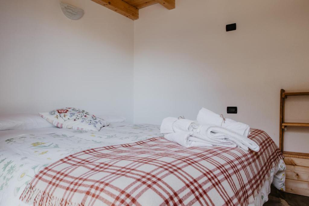 Postel nebo postele na pokoji v ubytování Agriturismo Le Piagge