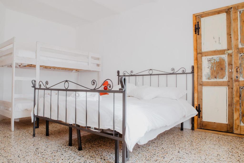 Postel nebo postele na pokoji v ubytování Agriturismo Le Piagge