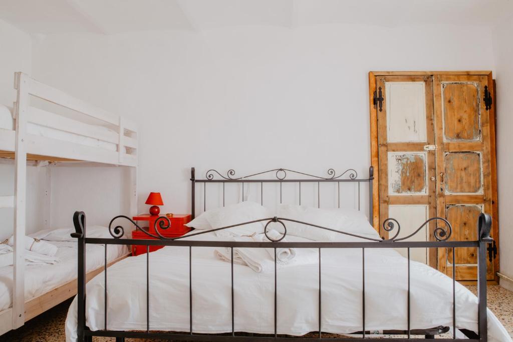 Postel nebo postele na pokoji v ubytování Agriturismo Le Piagge