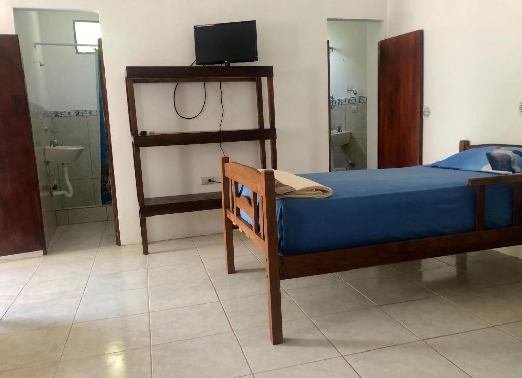 Postel nebo postele na pokoji v ubytování Hotel Santorini