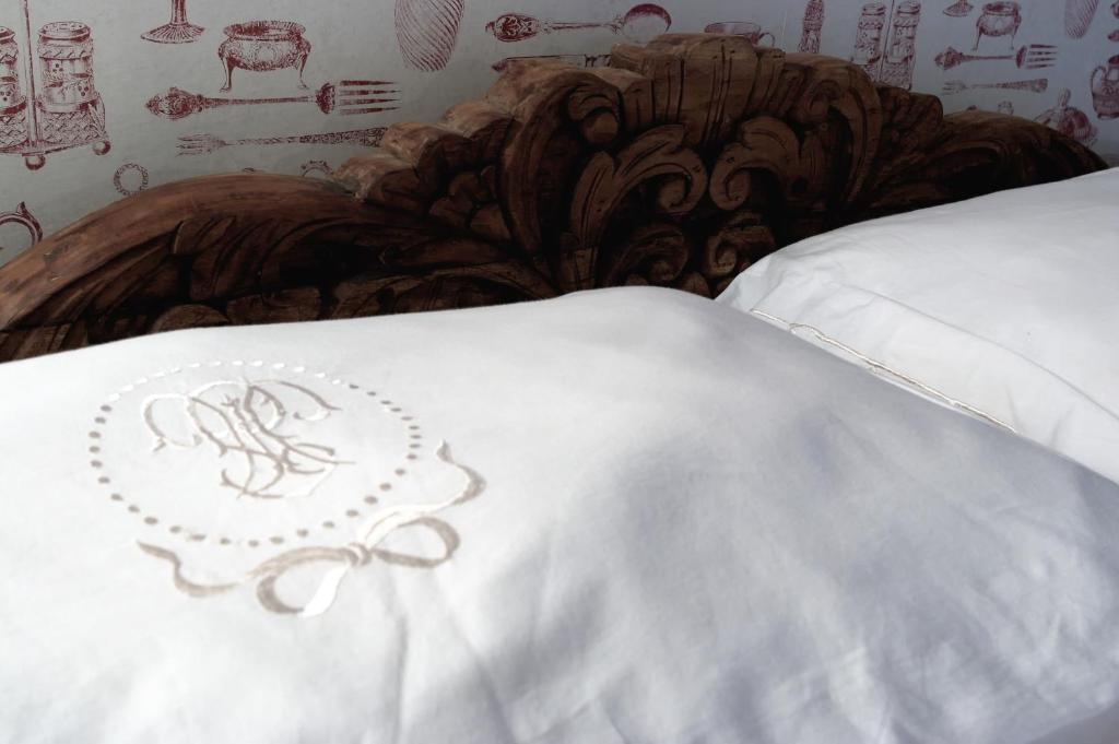 Łóżko lub łóżka w pokoju w obiekcie B&B La Cuntana