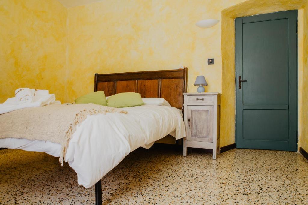 Postel nebo postele na pokoji v ubytování Agriturismo Le Piagge