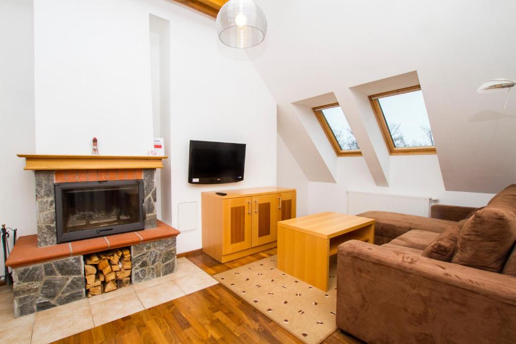 TV a/nebo společenská místnost v ubytování Luxury Apartments Bolf