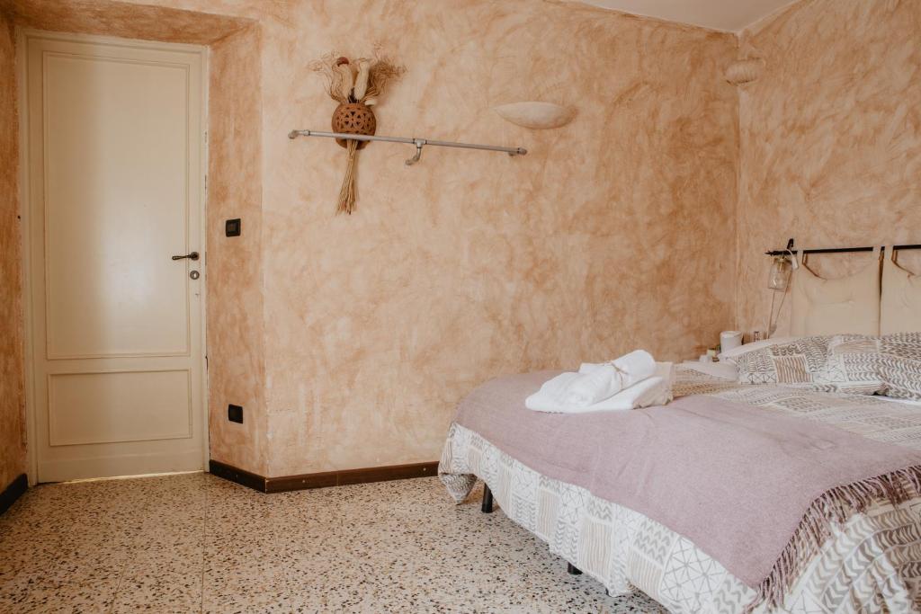 Postel nebo postele na pokoji v ubytování Agriturismo Le Piagge